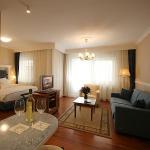 Luxe suite in het 5-sterren Hotel Queens Court Hotel en Residence