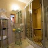 Wellness Hotel Cegled - Hotel Aquarell - хорошо и красиво освещенная ванная в велнес- и лечебном отеле Aquarell Cegléd, Hungary