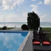 Betaalbare accommodatie in Siofok, Hongarije - Hotel Europa - zonondergang bij het Gouden Strand ('Aranypart')