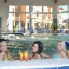 Indoor pool and jacuzzi in Aqua Spa Wellness Hotel Cserkeszolo