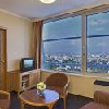 Sypialnia dwuosobowa w czterogwiazdkowym Hotelu okrągłym Budapest 