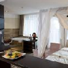 Luksusowy pokój z łożem z baldachimem i jacuzzi w hotelu Ozon 