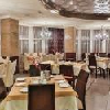 Элегантный ресторан отеля Hotel Apollo - велнес- и термальный отель вблизи Аквапарка