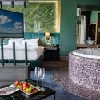 Chambre avec jacuzzi pour un weekend romantique à l'Hotel Azur Premium