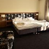 L'elegante camera dell'hotel Bodrogi Kuria con mezza pensione