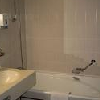 Badezimmer in Thermal- und  Konferenzhotel Helia in Budapest Badezimmer in Thermal- und  Konferenzhotel Helia in Budapest